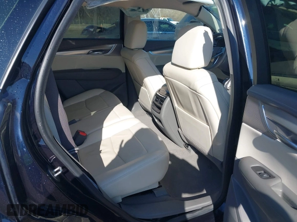 2021 Cadillac XT5 FWD Premium Luxury z VIN 1GYKNCRS2MZ141440, wystawiony jako IAAI lot #41874409 z przebiegiem 76 911 mil mil oraz . Historia ofert i sprzedaży dostępna na DreamBid. Obrazek 8.