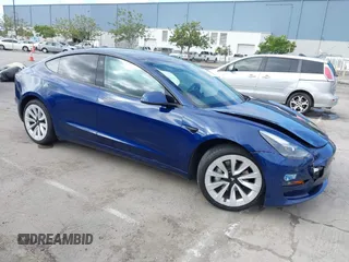 2021 Tesla Model 3 Standard Range Plus z VIN 5YJ3E1EA9MF020860, wystawiony jako IAAI lot #42246074 z przebiegiem 52 674 mil mil oraz . Historia ofert i sprzedaży dostępna na DreamBid. Obrazek 1.