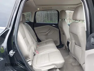 2016 Ford Escape Titanium with VIN 1FMCU9J91GUA59639, listed as a IAAI auction lot 41058369 with 138,046 mi miles. Bid and sale history available at carsss.com. Image 8.