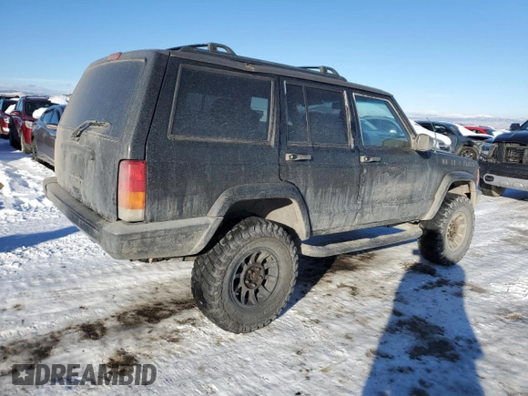 2001 Jeep Cherokee Sport with VIN 1J4FT48S41L615093, listed as a Copart auction lot 88459365 with 257,336 mi miles and Clean Title. Bid and sale history available at carsss.com. Image 3.
