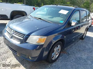 2008 Dodge Grand Caravan SXT with VIN 2D8HN54X68R634845, listed as a IAAI auction lot 42014757 with 237,542 mi miles. Bid and sale history available at carsss.com. Image 2.