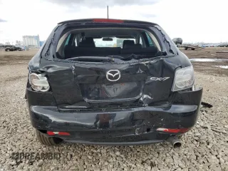 2010 Mazda CX-7 Sport with VIN JM3ER2W53A0337555, listed as a Copart auction lot 52317105 with 206,035 mi miles and Salvage Title. Bid and sale history available at DreamBid. Image 6.