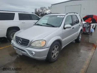 2003 Mercedes-Benz M-Class 3.7L with VIN 4JGAB57E43A410484, listed as a Copart auction lot 43966195 with 122,957 mi miles and Salvage Title. Bid and sale history available at carsss.com. Image 1.