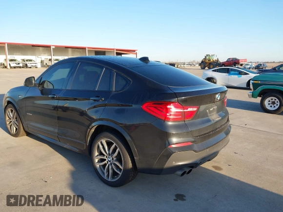 2018 BMW X4 xDrive28i with VIN 5UXXW3C59J0T80560, listed as a IAAI auction lot 41734915 with 122,850 mi miles. Bid and sale history available at carsss.com. Image 3.
