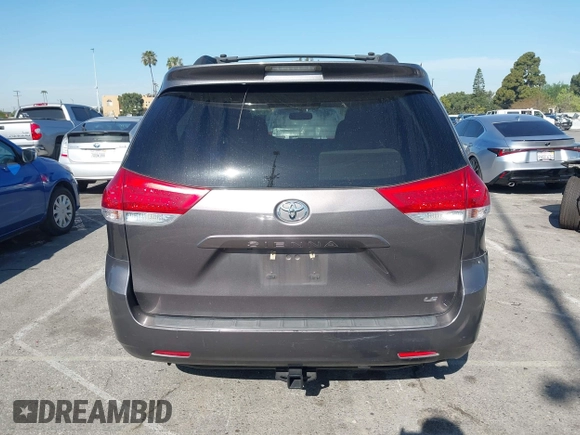 2014 Toyota Sienna LE AAS with VIN 5TDKK3DC6ES521706, listed as a IAAI auction lot 41999188 with 104,867 mi miles. Bid and sale history available at carsss.com. Image 16.