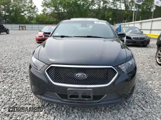2016 Ford Taurus SHO z VIN 1FAHP2KT4GG118397, wystawiony jako Copart lot #59911415 z przebiegiem 136 530 mil mil oraz Czysty tytuł • Clean title. Historia ofert i sprzedaży dostępna na DreamBid. Obrazek 5.