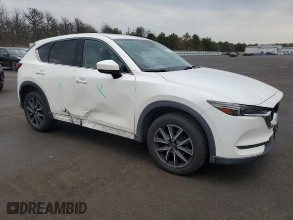 2017 Mazda CX-5 Grand Touring with VIN JM3KFBDL1H0208186, listed as a Copart auction lot 52685955 with 125,414 mi miles and Salvage Title. Bid and sale history available at carsss.com. Image 4.