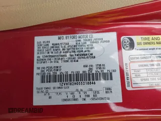 2005 Ford Mustang GT Deluxe z VIN 1ZVHT82H055218846, wystawiony jako IAAI lot #42169493 z przebiegiem 184 397 mil mil oraz . Historia ofert i sprzedaży dostępna na DreamBid. Obrazek 9.