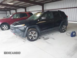 2014 Jeep Cherokee Trailhawk with VIN 1C4PJMBS3EW150366, listed as a IAAI auction lot 41971035 with 90,994 mi miles. Bid and sale history available at carsss.com. Image 2.