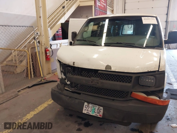 2011 Chevrolet Express Cargo Van with VIN 1GCWGGFAXB1122893, listed as a IAAI auction lot 41695753 with 232,658 mi miles. Bid and sale history available at carsss.com. Image 12.