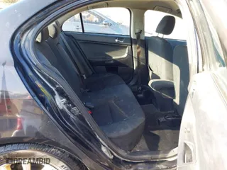2016 Mitsubishi Lancer ES with VIN JA32U2FUXGU003461, listed as a IAAI auction lot 41804879 with 147,036 mi miles. Bid and sale history available at carsss.com. Image 8.
