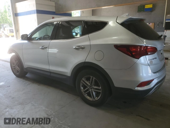 2017 Hyundai Santa Fe 2.4L z VIN 5XYZTDLB4HG440683, wystawiony jako Copart lot #55408975 z przebiegiem 105 014 mil mil oraz Szkoda całkowita • Salvage title. Historia ofert i sprzedaży dostępna na DreamBid. Obrazek 2.