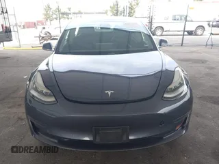 2020 Tesla Model 3 Standard Range Plus with VIN 5YJ3E1EA8LF743405, listed as a IAAI auction lot 41923592 with 81,901 mi miles. Bid and sale history available at carsss.com. Image 12.