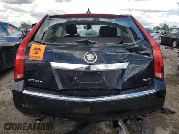 2014 Cadillac CTS with VIN 1G6DH8E3XE0134312, listed as a Copart auction lot 61556874 with 77,194 mi miles and Salvage Title. Bid and sale history available at DreamBid. Image 6.