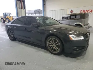 2017 Audi A8 Sport z VIN WAU43AFD4HN020515, wystawiony jako Copart lot #44953055 z przebiegiem 115 422 mil mil oraz Szkody całkowita. Historia ofert i sprzedaży dostępna na DreamBid. Obrazek 4.
