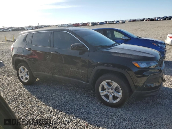 2023 Jeep Compass Sport with VIN 3C4NJDAN9PT559015, listed as a Copart auction lot 50590005 with 18,843 mi miles and Salvage title. Bid and sale history available at DreamBid. Image 4.