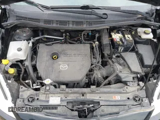 2015 Mazda 5 Sport with VIN JM1CW2BL2F0190990, listed as a IAAI auction lot 42532210 with 98,528 mi miles and . Bid and sale history available at DreamBid. Image 10.