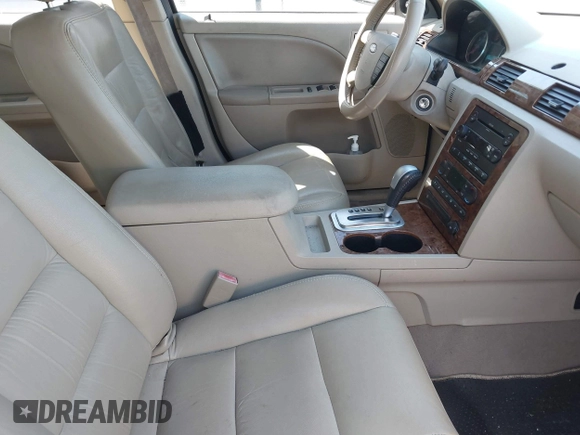 2006 Ford Five Hundred SEL with VIN 1FAFP24126G117587, listed as a IAAI auction lot 42058825 with 183,380 mi miles. Bid and sale history available at carsss.com. Image 5.