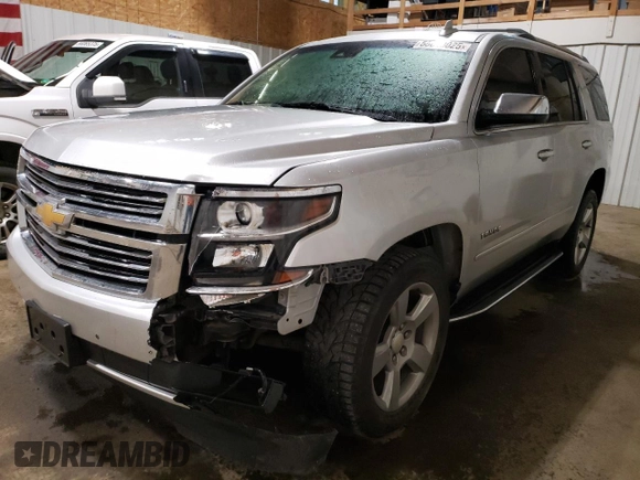 2018 Chevrolet Tahoe Premier with VIN 1GNSKCKCXJR160533, listed as a Copart auction lot 55648025 with 102,243 mi miles and Salvage title. Bid and sale history available at DreamBid. Image 1.
