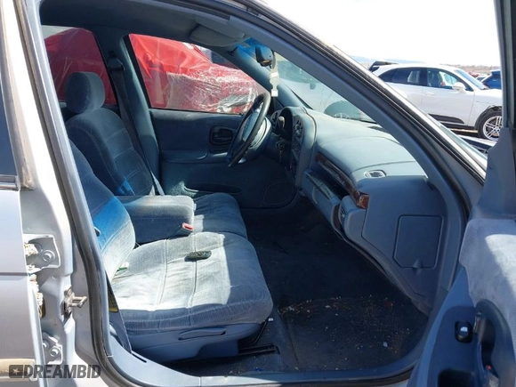 1997 Chevrolet Lumina with VIN 2G1WL52M5V9216883, listed as a IAAI auction lot 41797511 with 231,779 mi miles. Bid and sale history available at carsss.com. Image 5.