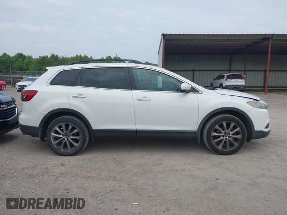 2015 Mazda CX-9 Grand Touring with VIN JM3TB2DA7F0448886, listed as a IAAI auction lot 42440203 with 108,765 mi miles and . Bid and sale history available at DreamBid. Image 13.