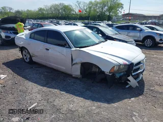 2014 Dodge Charger SE with VIN 2C3CDXBG5EH197260, listed as a IAAI auction lot 42072916 with 183,206 mi miles and . Bid and sale history available at DreamBid. Image 1.