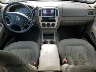 2003 Mercury Mountaineer Convenience z VIN 4M2ZU86K43UJ18143, wystawiony jako Copart lot #70650554 z przebiegiem 248 302 mil mil oraz Szkody całkowita. Historia ofert i sprzedaży dostępna na DreamBid. Obrazek 8.