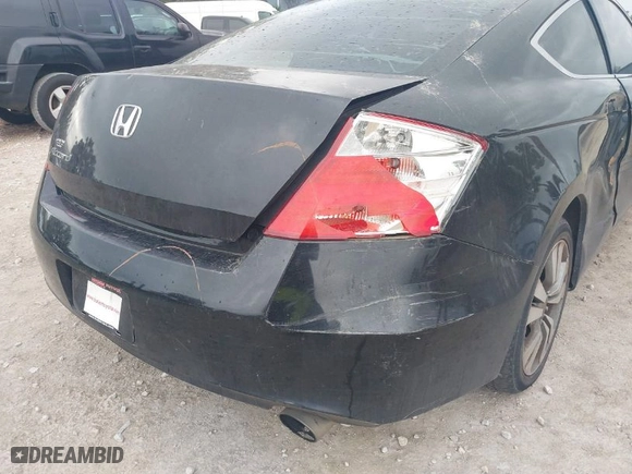 2009 Honda Accord Cpe EX-L with VIN 1HGCS12889A025298, listed as a IAAI auction lot 41765011 with NaN miles. Bid and sale history available at carsss.com. Image 16.