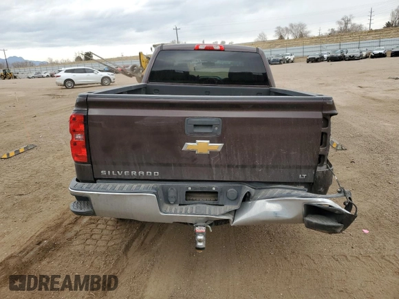 2016 Chevrolet Silverado 1500 LT with VIN 3GCUKREC9GG262656, listed as a Copart auction lot 44765435 with 112,940 mi miles and Salvage Title. Bid and sale history available at DreamBid. Image 6.