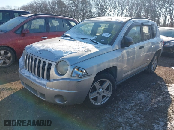 2007 Jeep Compass Sport with VIN 1J8FF47W47D396942, listed as a IAAI auction lot 41403901 with 999,999 mi miles. Bid and sale history available at carsss.com. Image 2.