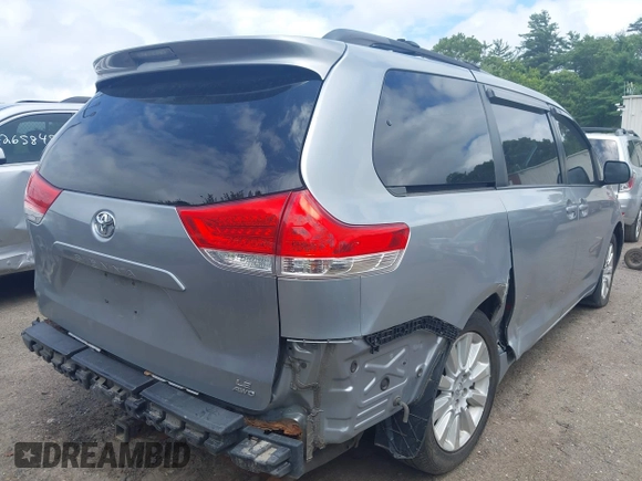 2013 Toyota Sienna LE with VIN 5TDJK3DC9DS054310, listed as a IAAI auction lot 42668103 with 209,712 mi miles and . Bid and sale history available at DreamBid. Image 4.
