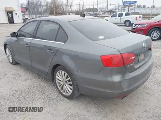 2014 Volkswagen Jetta TDI with VIN 3VWLL7AJ0EM389924, listed as a IAAI auction lot 41271290 with 241,452 mi miles and . Bid and sale history available at DreamBid. Image 3.