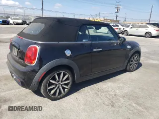 2016 MINI Convertible S z VIN WMWWG9C51G3C22038, wystawiony jako Copart lot #71986764 z przebiegiem 109 071 mil mil oraz Szkoda całkowita • Salvage title. Historia ofert i sprzedaży dostępna na DreamBid. Obrazek 3.