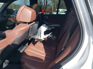2020 BMW X5 M50i with VIN 5UXJU4C06LLE45651, listed as a IAAI auction lot 41618355 with 70,885 mi miles and . Bid and sale history available at DreamBid. Image 8.