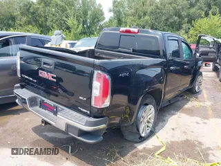 2018 GMC Canyon 4WD SLT with VIN 1GTG6DEN5J1131459, listed as a IAAI auction lot 39954201 with 146,721 mi miles and . Bid and sale history available at carsss.com. Image 4.
