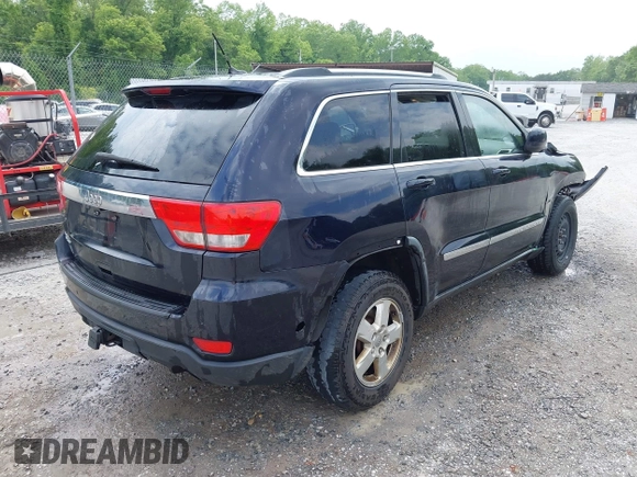 2011 Jeep Grand Cherokee Laredo with VIN 1J4RR4GG8BC543468, listed as a IAAI auction lot 42431481 with 224,639 mi miles and . Bid and sale history available at DreamBid. Image 4.