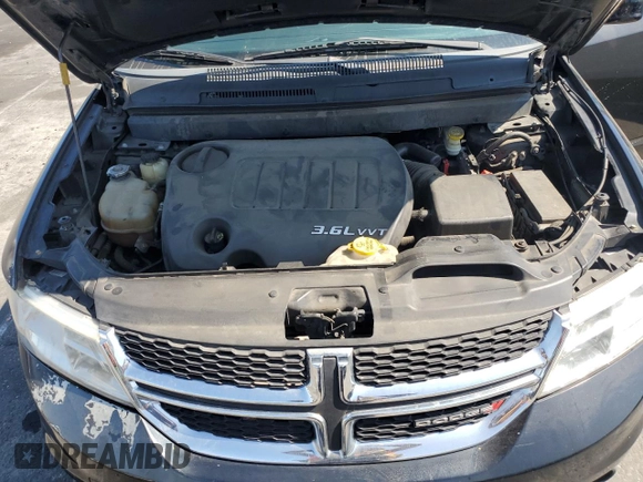2015 Dodge Journey SXT with VIN 3C4PDCBG6FT718131, listed as a Copart auction lot 62214265 with 108,986 mi miles and Salvage title. Bid and sale history available at DreamBid. Image 12.