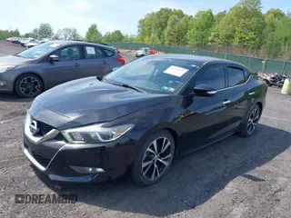 2018 Nissan Maxima SV with VIN 1N4AA6APXJC369633, listed as a IAAI auction lot 42256821 with 67,819 mi miles and . Bid and sale history available at DreamBid. Image 2.