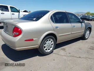 2000 Nissan Maxima GXE z VIN JN1CA31D0YT739248, wystawiony jako IAAI lot #42089086 z przebiegiem 140 979 mil mil oraz . Historia ofert i sprzedaży dostępna na DreamBid. Obrazek 4.