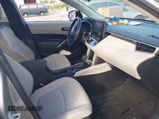 2022 Toyota Corolla Cross L with VIN 7MUAAAAG6NV010688, listed as a IAAI auction lot 41212520 with 50,075 mi miles and . Bid and sale history available at DreamBid. Image 5.