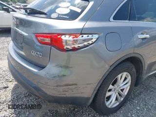 2014 Infiniti QX70 with VIN JN8CS1MW5EM411653, listed as a IAAI auction lot 42690935 with 110,806 mi miles and . Bid and sale history available at DreamBid. Image 6.