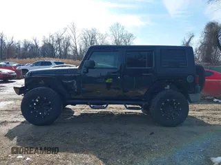 2008 Jeep Wrangler Unlimited Rubicon with VIN 1J8GA691X8L641959, listed as a IAAI auction lot 41586564 with 174,886 mi miles and . Bid and sale history available at DreamBid. Image 14.