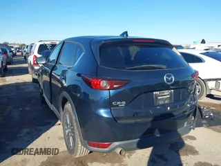 2021 Mazda CX-5 Touring with VIN JM3KFBCM3M1454879, listed as a IAAI auction lot 41311785 with 39,020 mi miles. Bid and sale history available at carsss.com. Image 3.