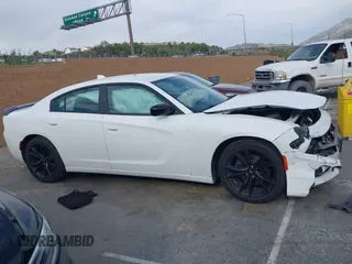 2018 Dodge Charger SXT Plus with VIN 2C3CDXHG4JH187580, listed as a IAAI auction lot 42024602 with 203,843 mi miles and . Bid and sale history available at carsss.com. Image 13.