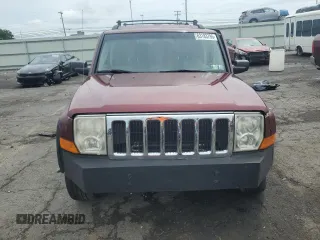 2007 Jeep Commander Sport with VIN 1J8HG48K17C702034, listed as a Copart auction lot 63183795 with 152,322 mi miles and Salvage title. Bid and sale history available at DreamBid. Image 5.