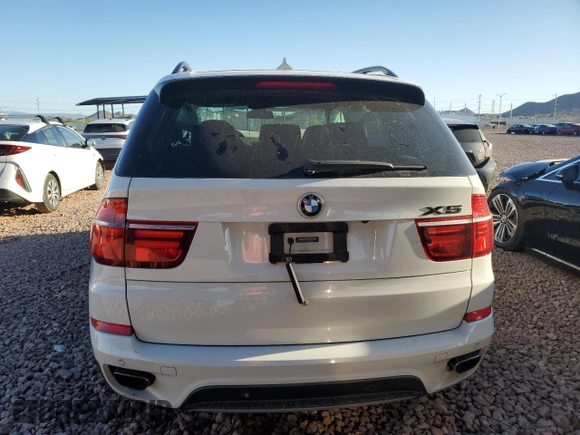 2013 BMW X5 xDrive50i with VIN 5UXZV8C55D0C16304, listed as a Copart auction lot 53406135 with 103,704 mi miles and Salvage title. Bid and sale history available at DreamBid. Image 6.