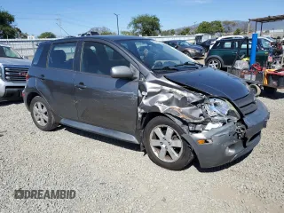 2004 Scion xA with VIN JTKKT624140043635, listed as a Copart auction lot 52808815 with 197,115 mi miles and Salvage Title. Bid and sale history available at DreamBid. Image 4.
