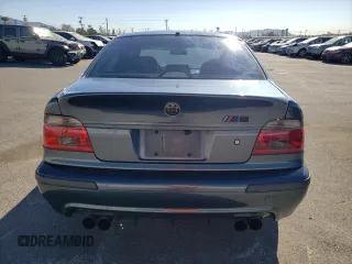 2000 BMW M5 z VIN WBSDE9349YBZ94615, wystawiony jako Copart lot #88802245 z przebiegiem 157 774 mil mil oraz Tytuł czysty. Historia ofert i sprzedaży dostępna na DreamBid. Obrazek 6.