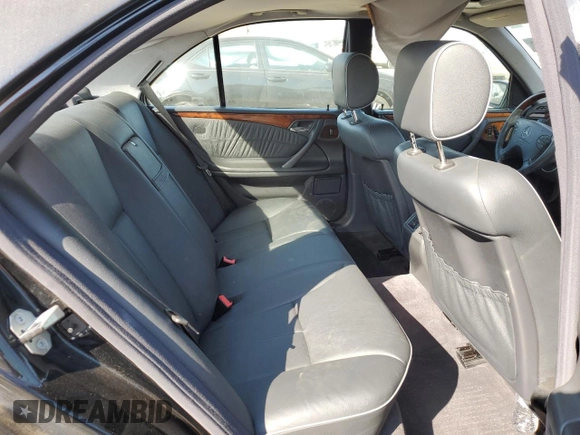 2002 Mercedes-Benz E-Class with VIN WDBJF70J22B489706, listed as a Copart auction lot 71109874 with 59,167 mi miles and Salvage Title. Bid and sale history available at carsss.com. Image 10.