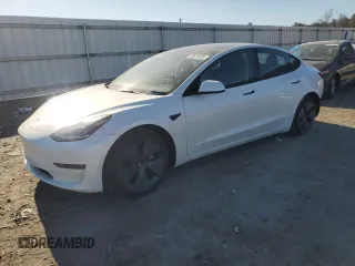 2023 Tesla Model 3 with VIN 5YJ3E1EA1PF556562, listed as a Copart auction lot 48413235 with 11,980 mi miles and Salvage Title. Bid and sale history available at DreamBid. Image 1.